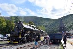 R&N Steam Locomotive # 2102 heads light past the Jim Thorpe Station to be attached to the 18 car consist